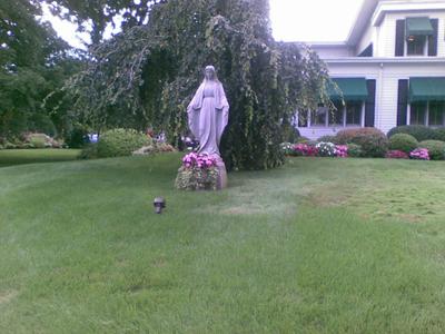 lok at the bottom right, of our ladys statue