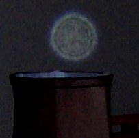 Face in Orb over lamp